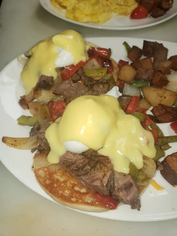 Eggs Benedict with home fries