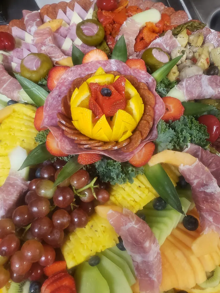 A Romanelli's deli platter with lox, vegetables and fruit